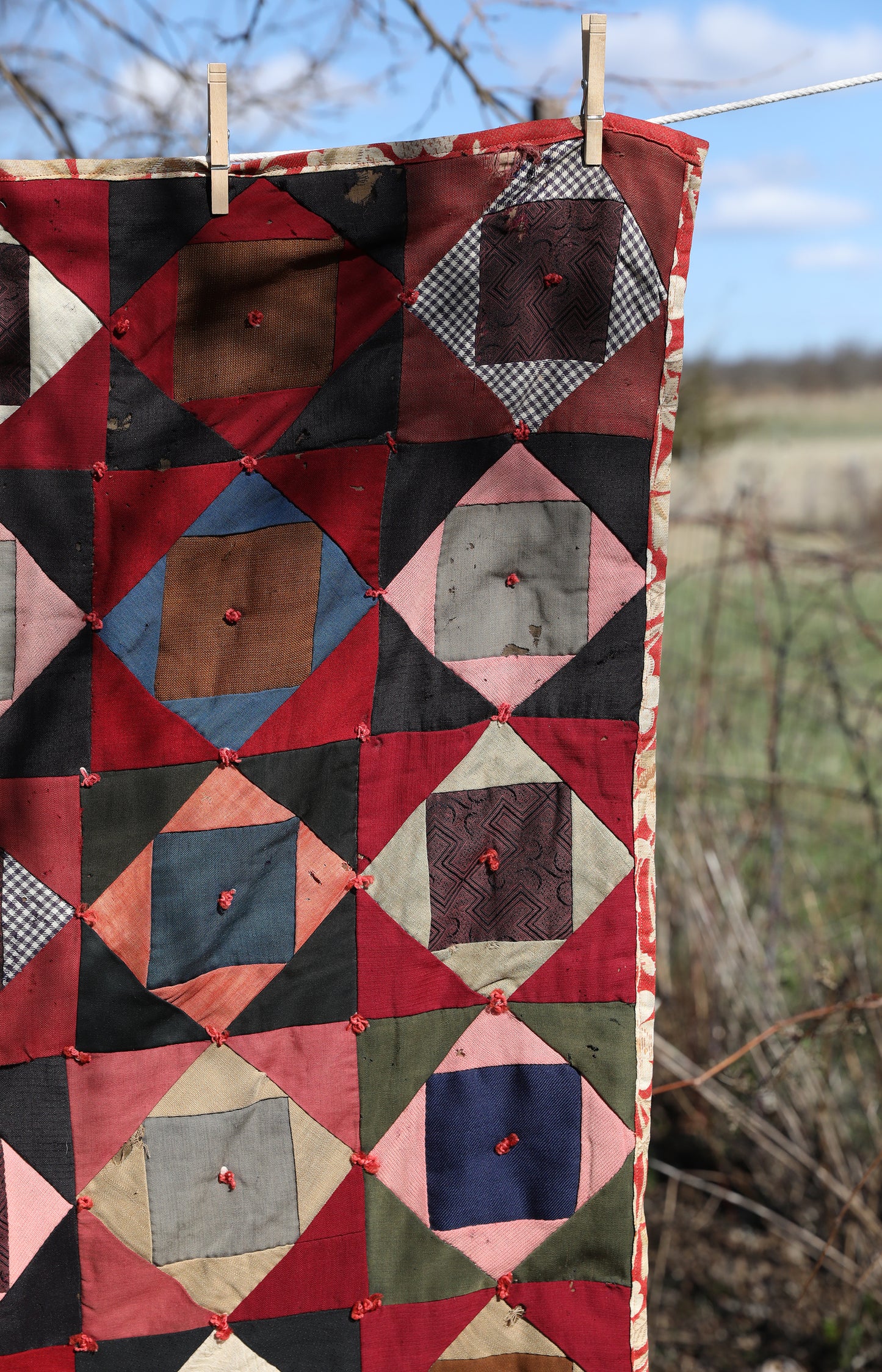 Antique Quilt with Red Floral Backing