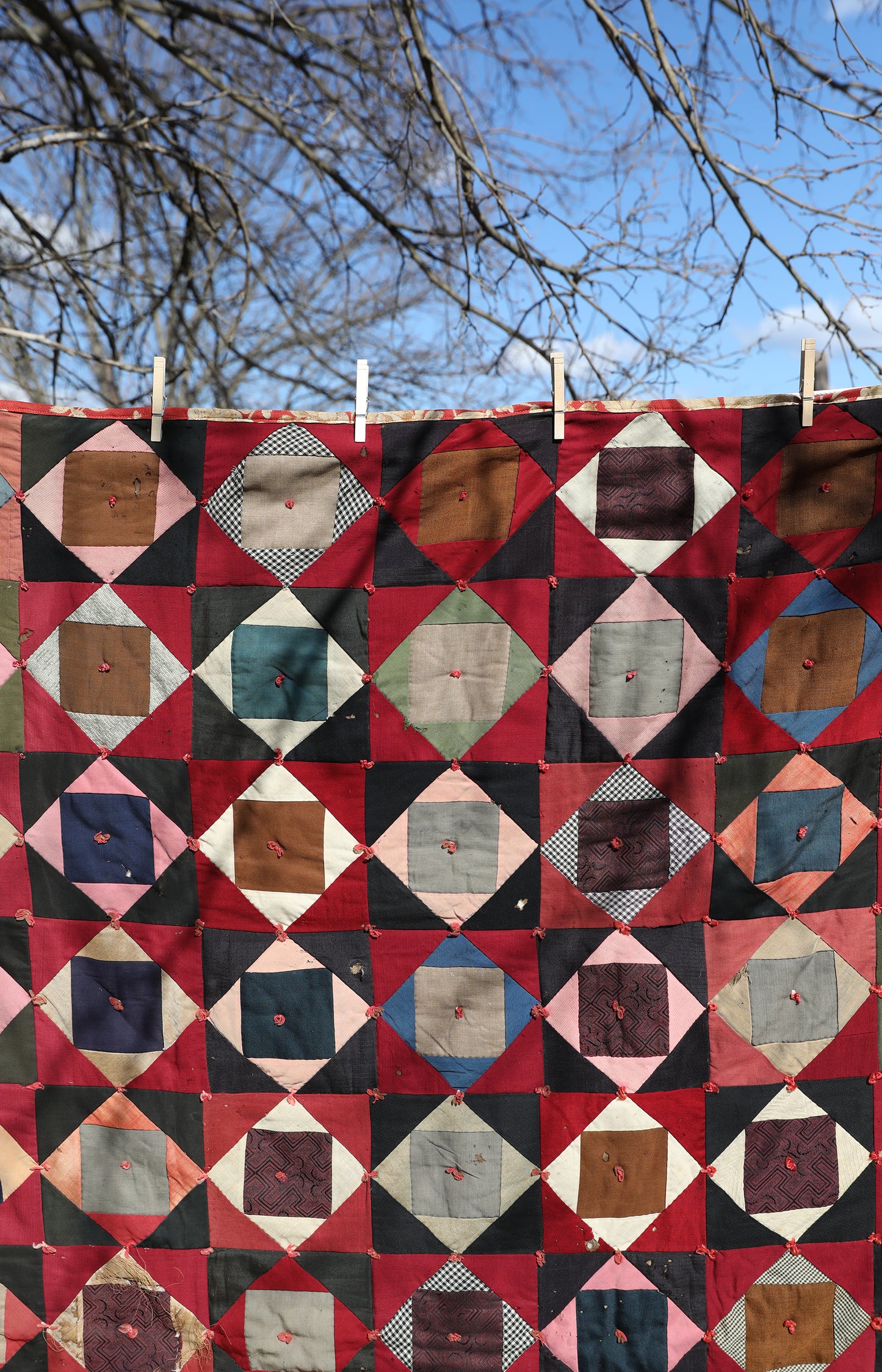 Antique Quilt with Red Floral Backing