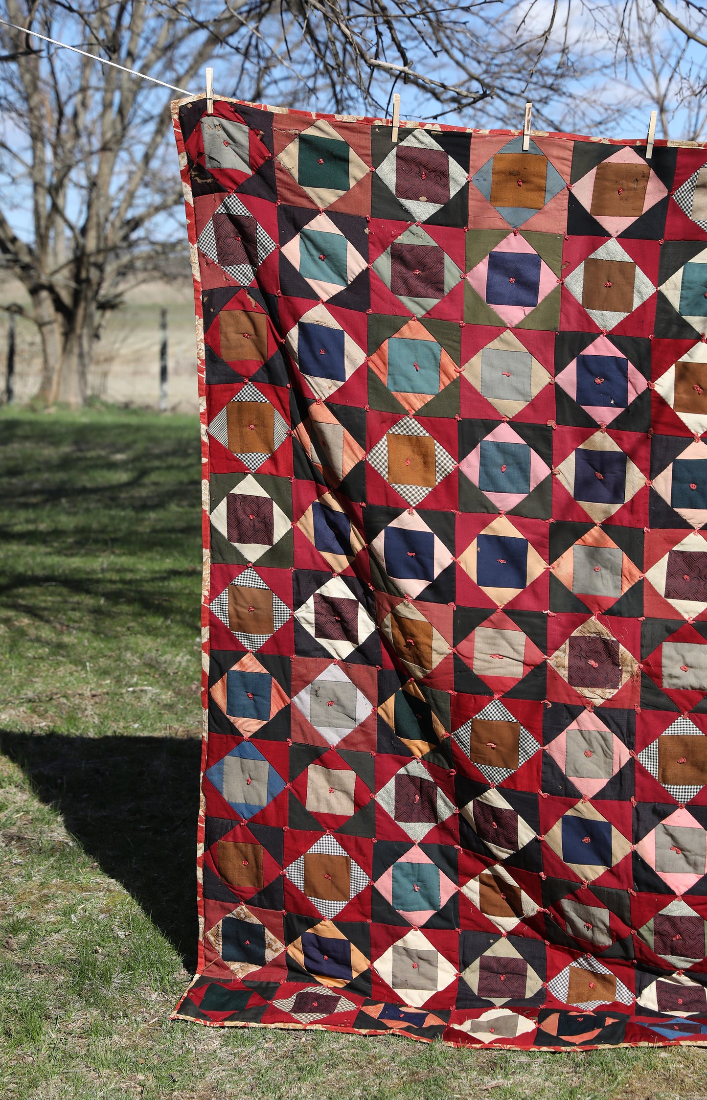 Antique Quilt with Red Floral Backing