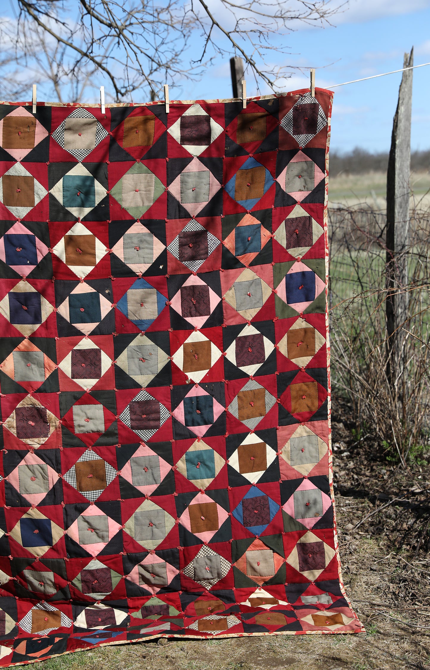 Antique Quilt with Red Floral Backing