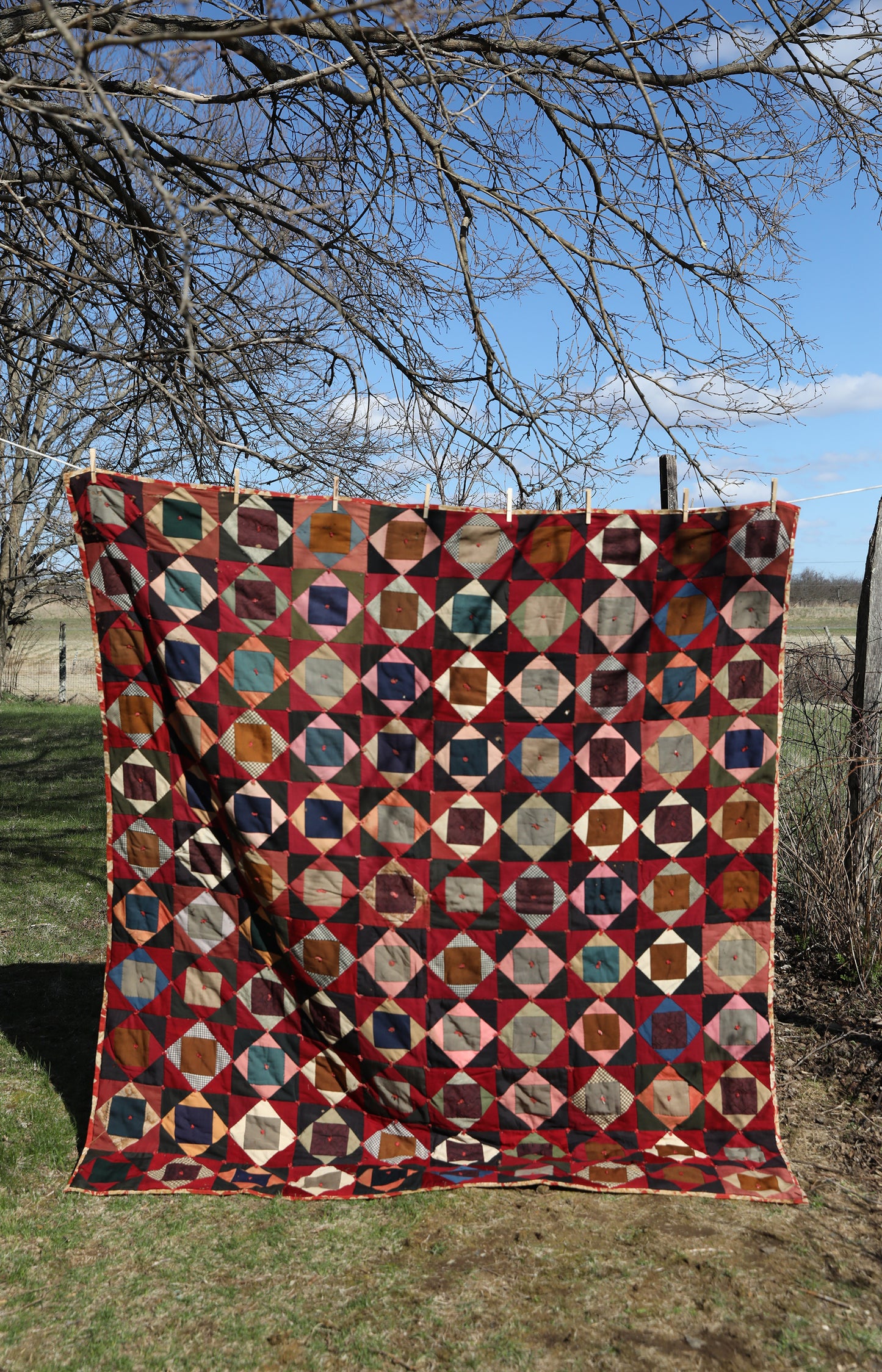 Antique Quilt with Red Floral Backing