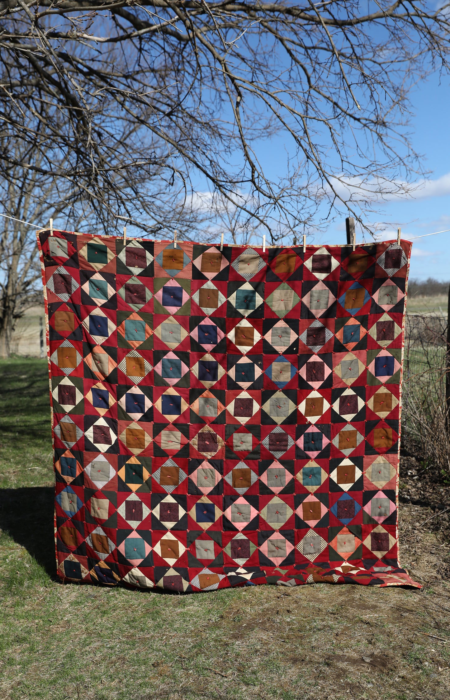 Antique Quilt with Red Floral Backing