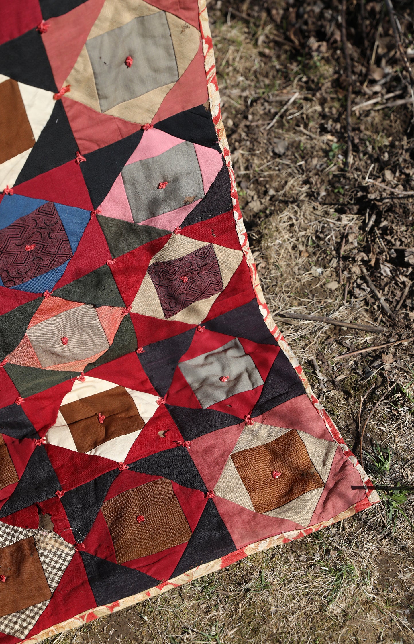 Antique Quilt with Red Floral Backing