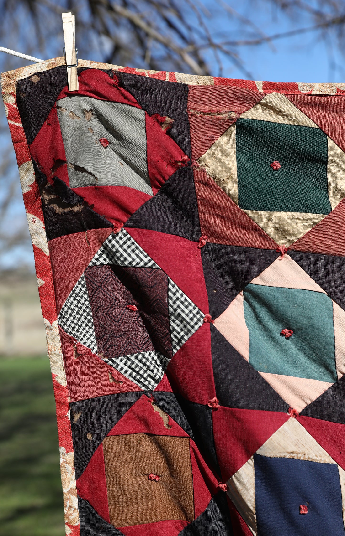 Antique Quilt with Red Floral Backing