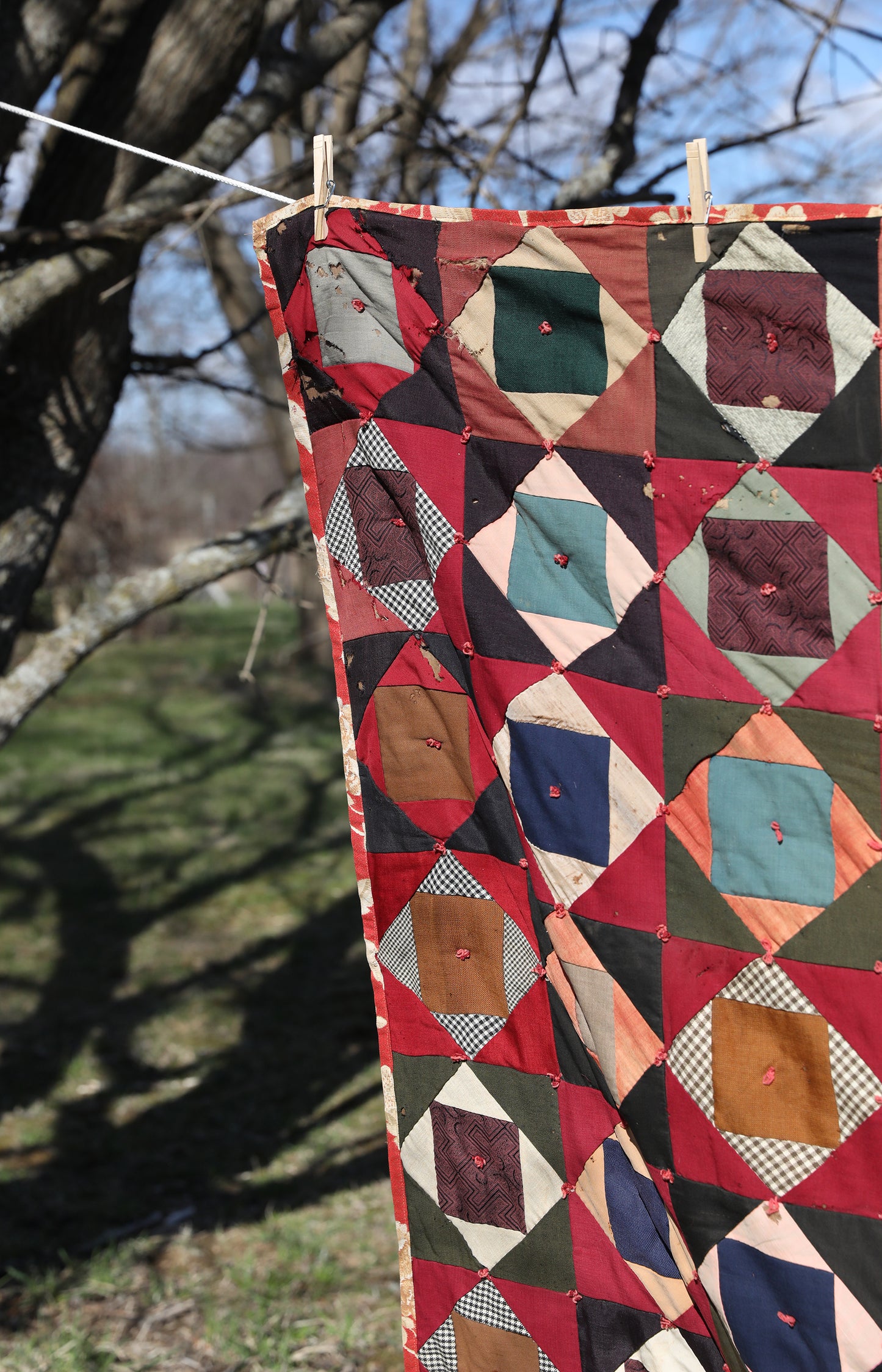 Antique Quilt with Red Floral Backing